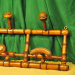 a vintage french faux bamboo coat rack