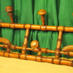 a vintage french faux bamboo coat rack