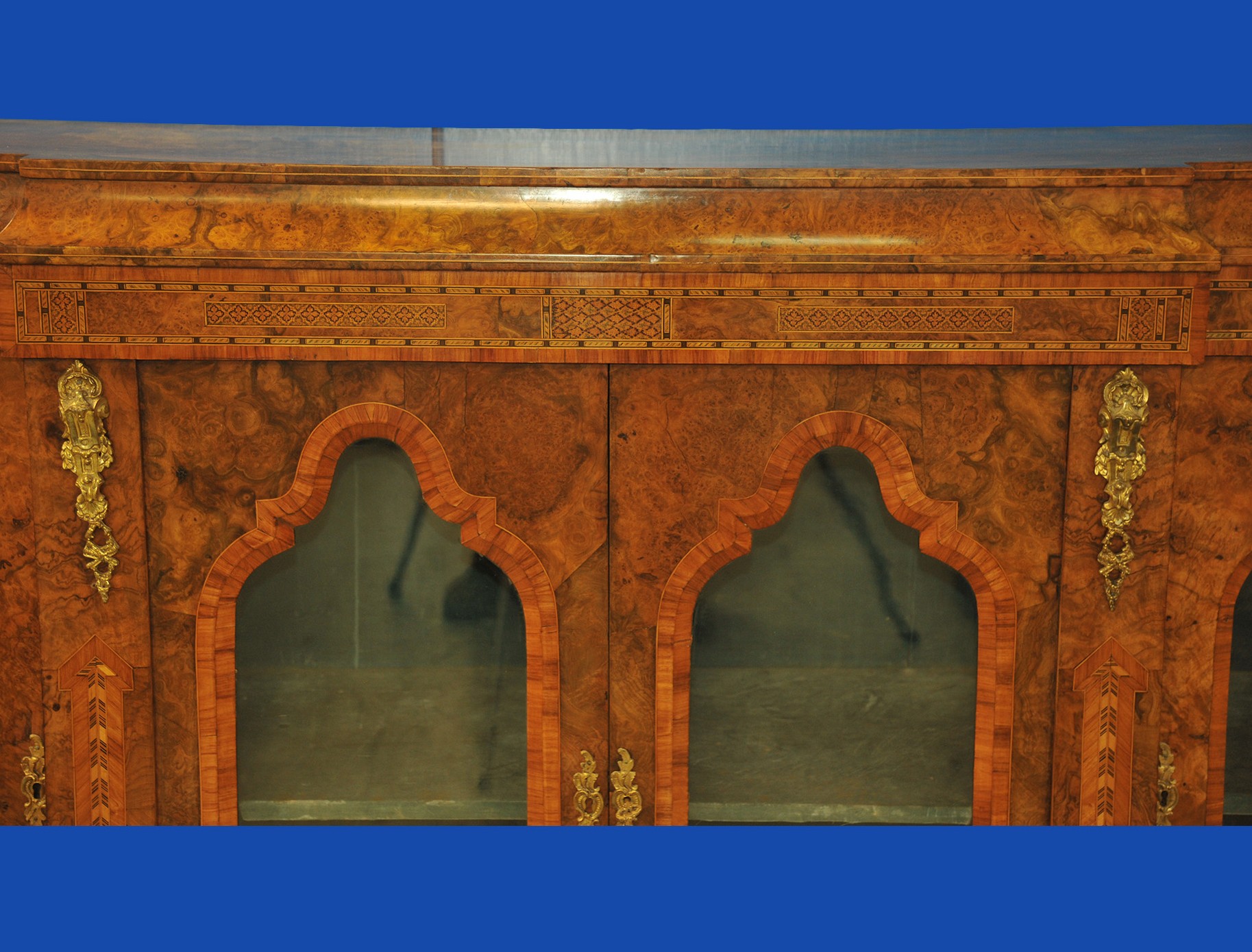 an english antique walnut and tunbridgeware inlaid glazed four door breakfront cabinet