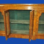 an english antique walnut and tunbridgeware inlaid glazed four door breakfront cabinet
