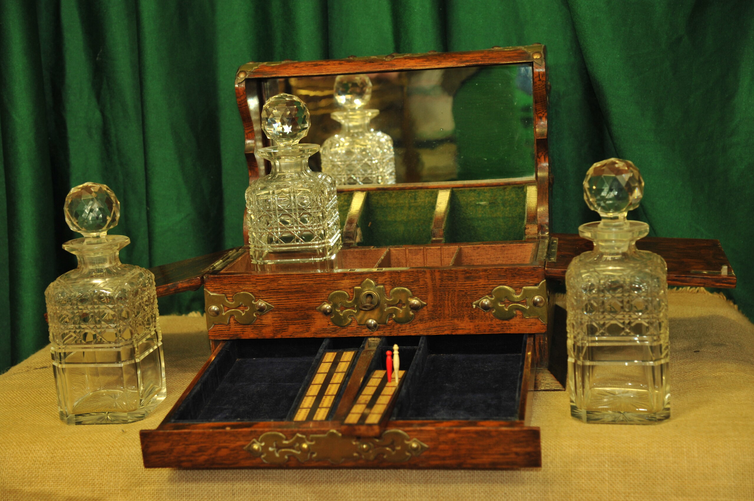 an antique oak tantalus games compendium
